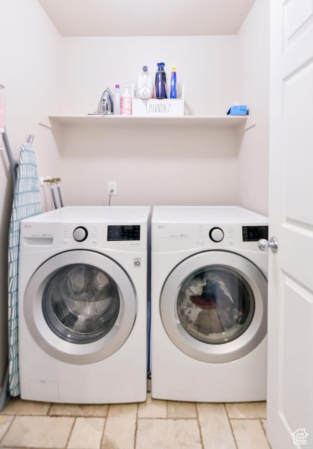 4931 W Berry Creek Dr, Riverton, UT 84096 - clothes washing area with separate washer and dryer