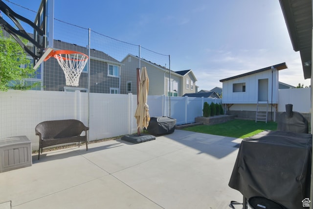 4931 W Berry Creek Dr, Riverton, UT 84096 - view of patio featuring a fenced backyard, a grill, and a residential view