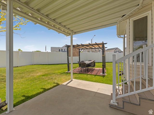 view of patio / terrace with a pergola and outdoor dining area
