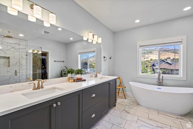 4591 N Abbey Way, Eden, UT 84310 - full bath featuring marble finish flooring, healthy amount of natural light, a shower stall, a soaking tub, and recessed lighting