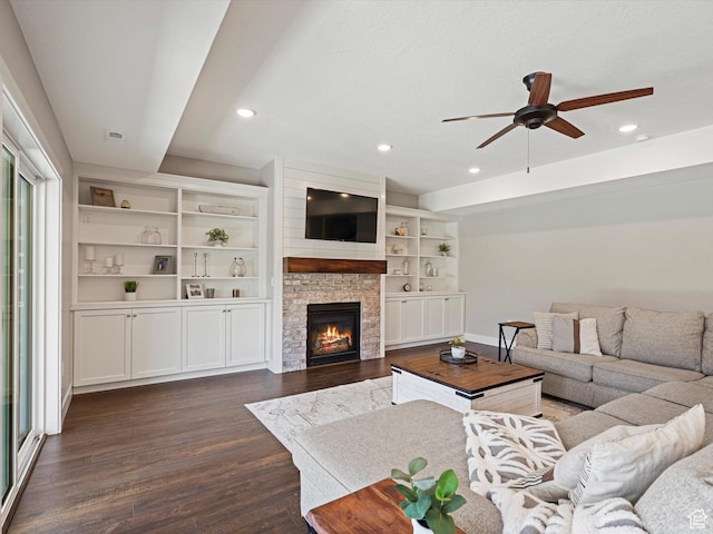 4591 N Abbey Way, Eden, UT 84310 - living area with ceiling fan, dark wood-style floors, recessed lighting, a glass covered fireplace, and baseboards