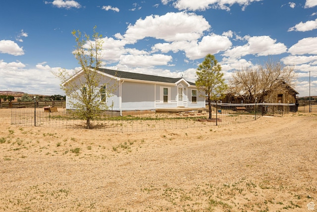 1074 Altus Ln, Fredonia, AZ 86022 - rear view of house with fence