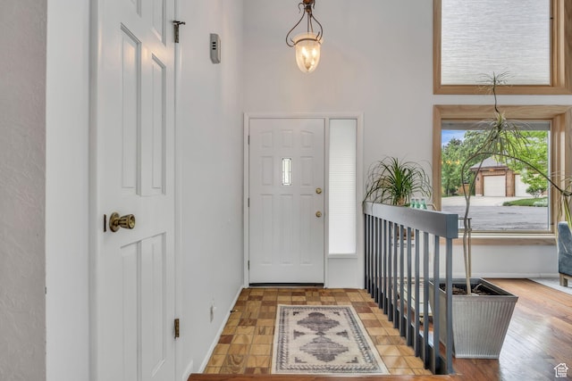 3270 E Danish Hills Cir, Salt Lake City, UT 84121 - entryway with a high ceiling and baseboards