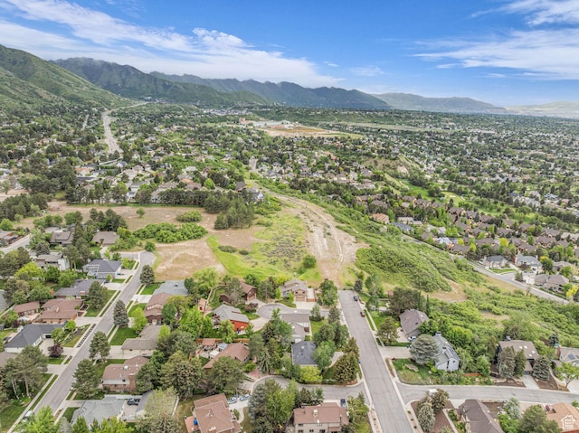 3270 E Danish Hills Cir, Salt Lake City, UT 84121 - aerial view of property and surrounding area with mountains and nearby suburban area