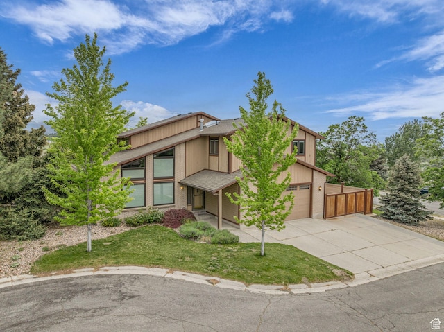 3270 E Danish Hills Cir, Salt Lake City, UT 84121 - mid-century home with driveway and a front yard