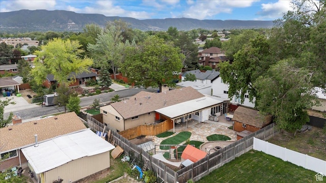 aerial view of residential area with a mountain backdrop