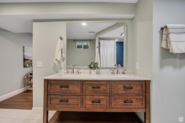 476 E 3050 N, North Ogden, UT 84414 - bathroom with double vanity, baseboards, and tile patterned floors