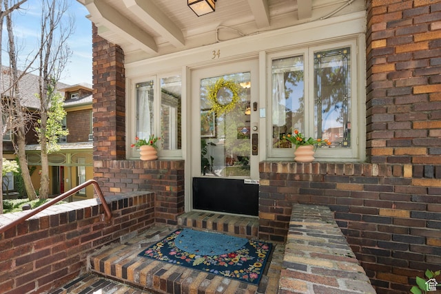 86 N B St Unit 34, Salt Lake City, UT 84150 - doorway to property with brick siding and a porch