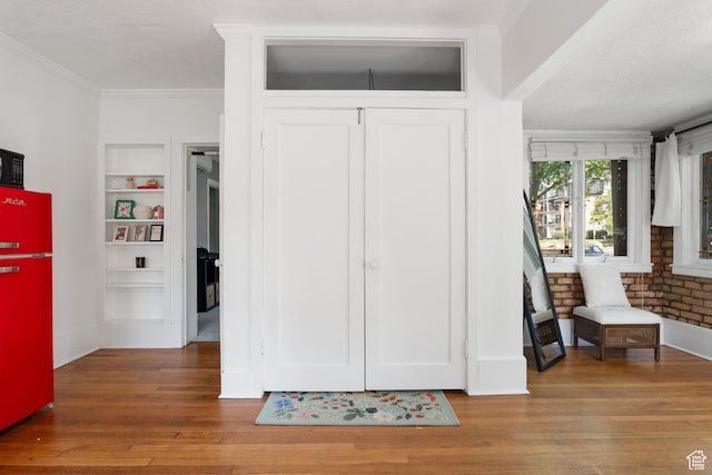 86 N B St Unit 34, Salt Lake City, UT 84150 - foyer with wood-type flooring, crown molding, and baseboards
