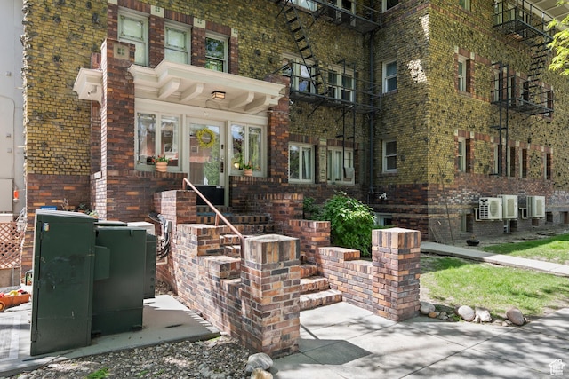 86 N B St Unit 34, Salt Lake City, UT 84150 - view of front of property with brick siding and ac unit