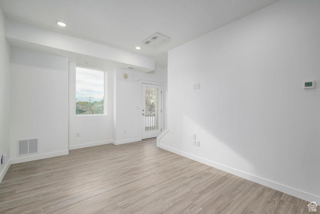 316 W Azure Sky Ln Unit 3-09, Salt Lake City, UT 84103 - empty room featuring light wood-style floors, baseboards, and recessed lighting