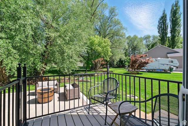 538 W 600 S, Logan, UT 84321 - deck with an outdoor living space with a fire pit and a lawn