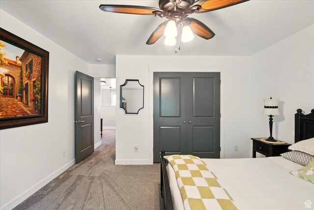 538 W 600 S, Logan, UT 84321 - carpeted bedroom with baseboards, a closet, and a ceiling fan