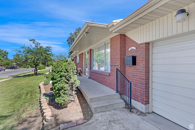 3927 W Rawhide Dr S, West Valley City, UT 84120 - doorway to property with brick siding and a yard