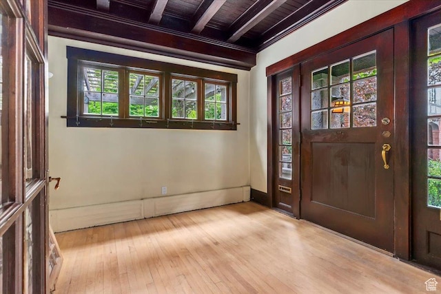 34 S Haxton Pl, Salt Lake City, UT 84102 - entrance foyer with beamed ceiling, wood ceiling, healthy amount of natural light, hardwood / wood-style floors, and a baseboard radiator