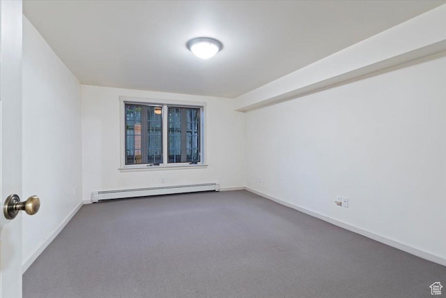 34 S Haxton Pl, Salt Lake City, UT 84102 - spare room with baseboard heating, carpet, and baseboards