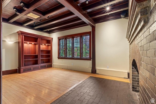 34 S Haxton Pl, Salt Lake City, UT 84102 - unfurnished living room featuring wooden ceiling, baseboards, beam ceiling, and wood finished floors