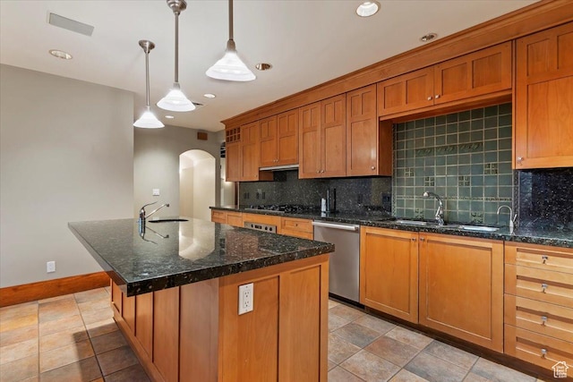 34 S Haxton Pl, Salt Lake City, UT 84102 - kitchen with a sink, stainless steel dishwasher, arched walkways, decorative backsplash, and recessed lighting