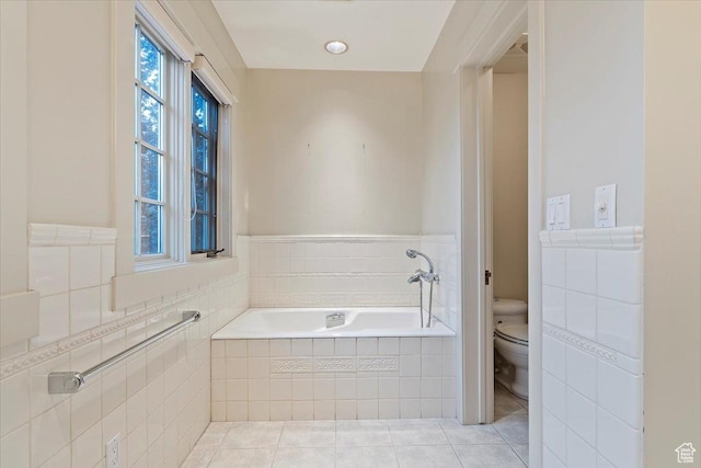 34 S Haxton Pl, Salt Lake City, UT 84102 - bathroom featuring a garden tub, toilet, and tile patterned floors