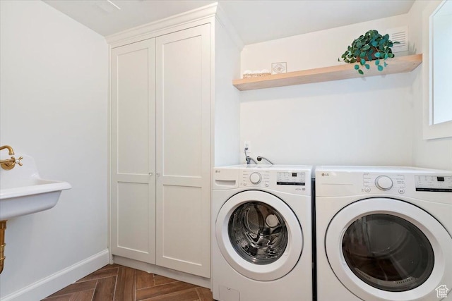 35 S Haxton Pl, Salt Lake City, UT 84102 - laundry room featuring washer and clothes dryer, cabinet space, and baseboards