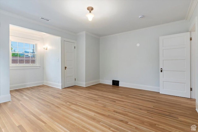 35 S Haxton Pl, Salt Lake City, UT 84102 - unfurnished room with light wood-style flooring, baseboards, ornamental molding, and a smoke detector