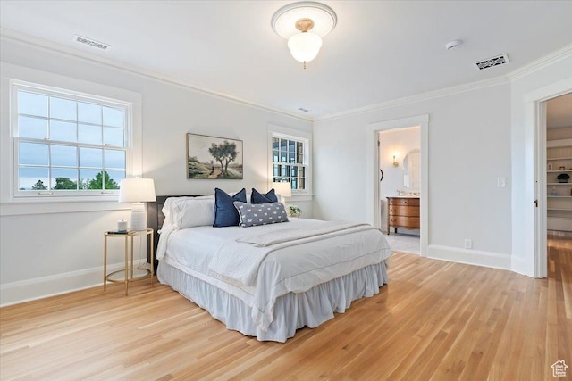 35 S Haxton Pl, Salt Lake City, UT 84102 - bedroom with baseboards, ornamental molding, light wood-style floors, and ensuite bathroom