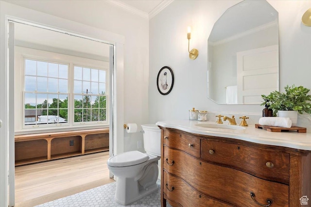 35 S Haxton Pl, Salt Lake City, UT 84102 - bathroom featuring crown molding, toilet, and vanity