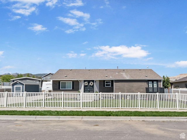 13956 S Wild Colt Cir, Herriman, UT 84096 - ranch-style house with a fenced front yard