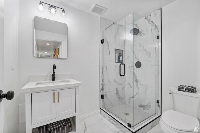 13956 S Wild Colt Cir, Herriman, UT 84096 - full bath featuring marble look tile flooring, toilet, a marble finish shower, vanity, and baseboards