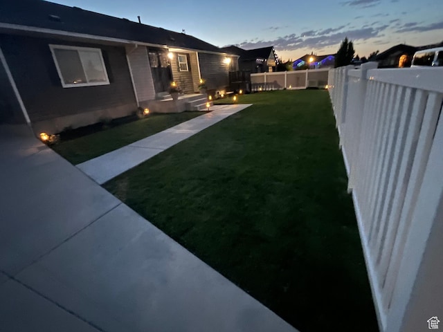 13956 S Wild Colt Cir, Herriman, UT 84096 - view of yard at dusk