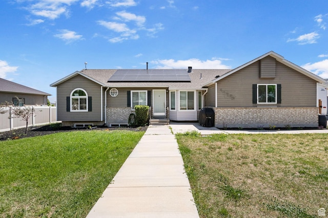 13956 S Wild Colt Cir, Herriman, UT 84096 - single story home with solar panels, brick siding, and a shingled roof
