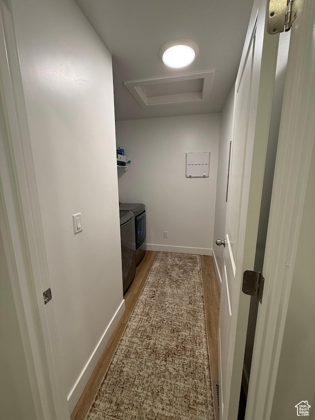 81 W 925 N, Brigham City, UT 84302 - laundry area featuring washing machine and dryer, attic access, wood finished floors, and baseboards