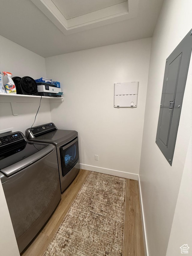 81 W 925 N, Brigham City, UT 84302 - washroom with independent washer and dryer, light wood-type flooring, electric panel, and baseboards