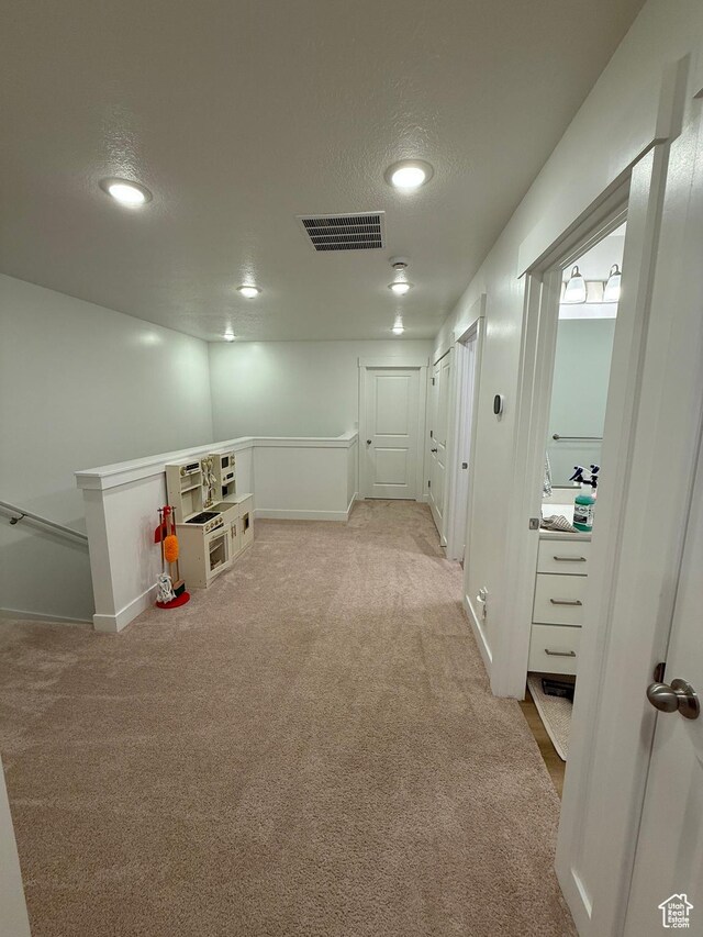 81 W 925 N, Brigham City, UT 84302 - hall with carpet, baseboards, recessed lighting, an upstairs landing, and a textured ceiling