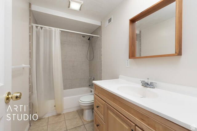 2956 W Mackay Meadows Pl, West Valley City, UT 84119 - full bath with vanity, tile patterned flooring, shower / bath combo with shower curtain, and toilet
