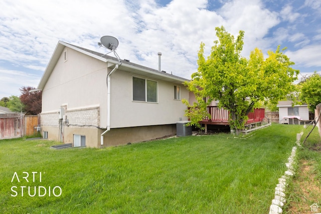 2956 W Mackay Meadows Pl, West Valley City, UT 84119 - back of house with a wooden deck, stucco siding, and central AC unit