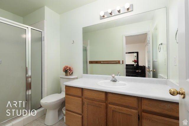 2956 W Mackay Meadows Pl, West Valley City, UT 84119 - bathroom with a shower stall, tile patterned flooring, vanity, and toilet
