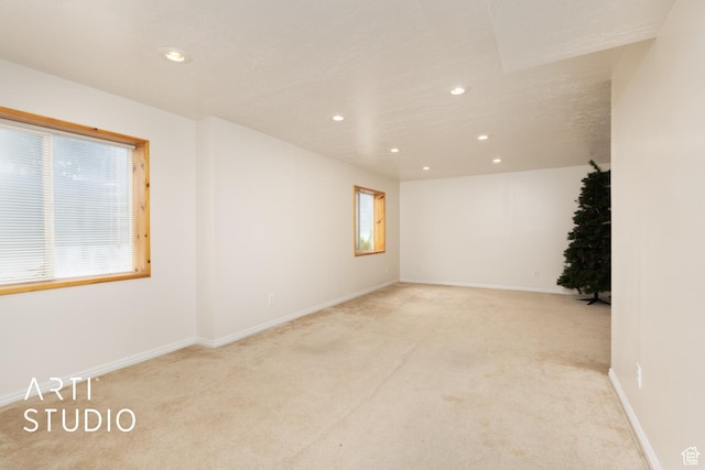 2956 W Mackay Meadows Pl, West Valley City, UT 84119 - empty room with light colored carpet, recessed lighting, and baseboards