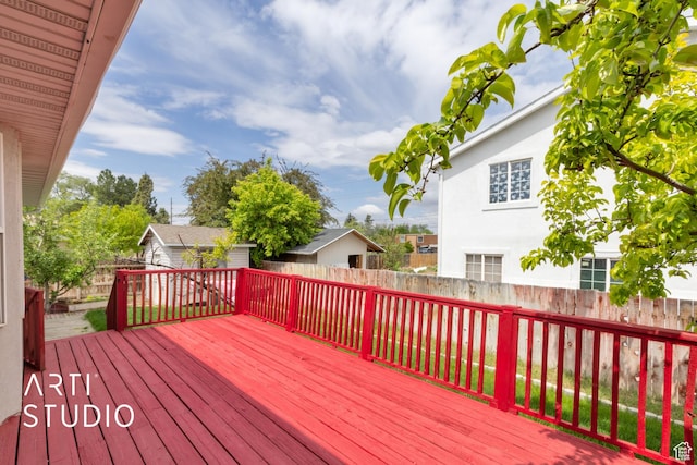 2956 W Mackay Meadows Pl, West Valley City, UT 84119 - deck featuring a fenced backyard, an outdoor structure, and a shed