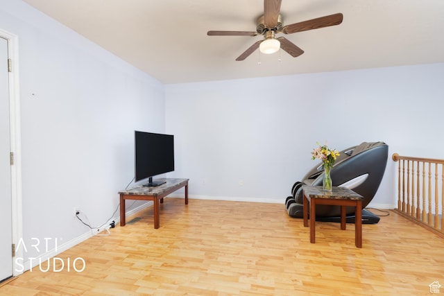 2956 W Mackay Meadows Pl, West Valley City, UT 84119 - sitting room featuring wood finished floors, ceiling fan, and baseboards