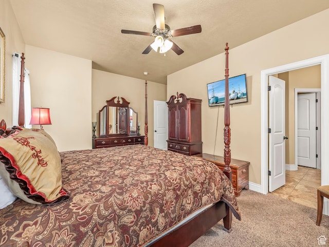 bedroom with carpet floors and a ceiling fan
