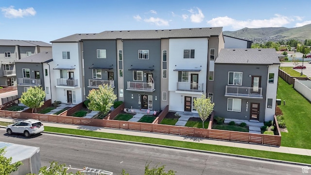 5368 W Sonova Ln S, Herriman, UT 84096 - view of property featuring a fenced front yard, a mountain view, and a residential view
