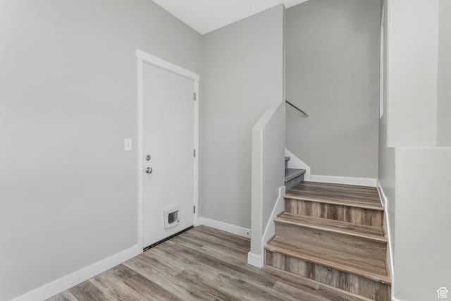 5368 W Sonova Ln S, Herriman, UT 84096 - staircase with wood finished floors and baseboards