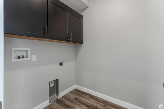 5368 W Sonova Ln S, Herriman, UT 84096 - clothes washing area featuring hookup for an electric dryer, cabinet space, washer hookup, baseboards, and dark wood finished floors