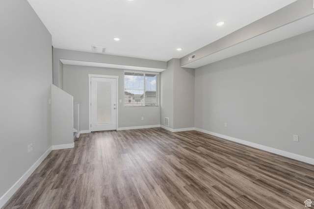 5368 W Sonova Ln S, Herriman, UT 84096 - unfurnished room featuring wood finished floors, baseboards, and recessed lighting