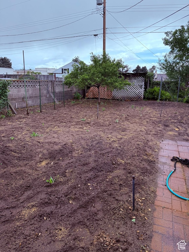 view of yard with fence