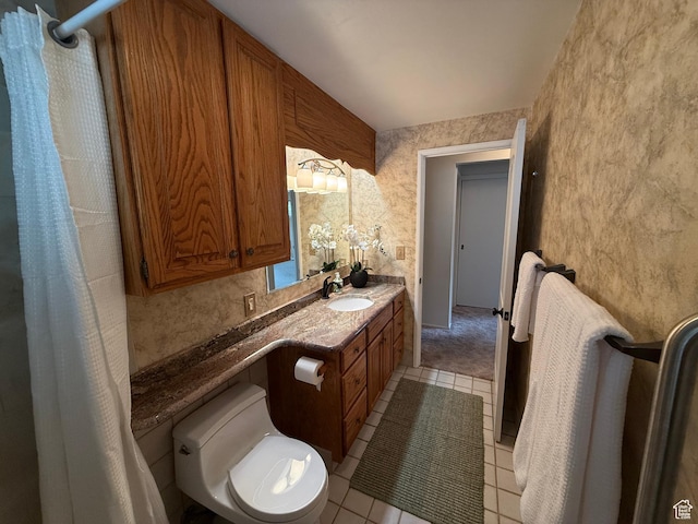 full bathroom with tile patterned flooring and vanity