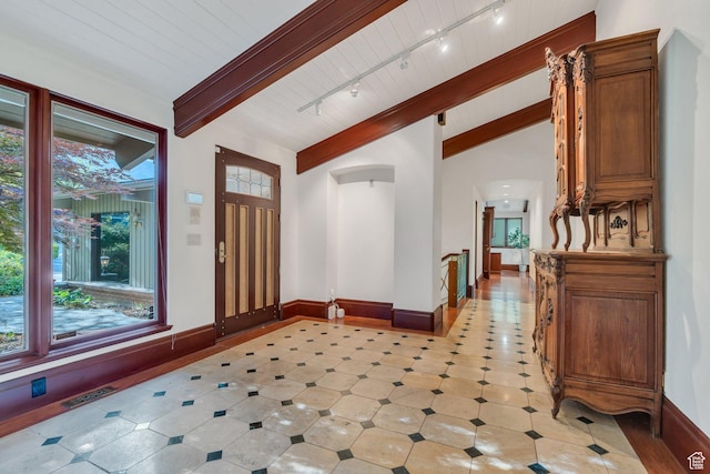 3223 Apache Ln, Provo, UT 84604 - entryway with plenty of natural light, track lighting, arched walkways, and baseboards