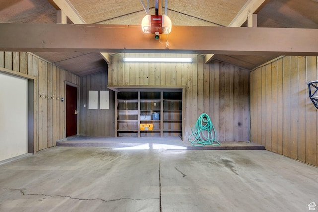 3223 Apache Ln, Provo, UT 84604 - garage with a garage door opener and wood walls