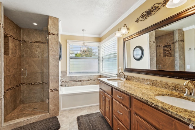 full bathroom with a stall shower, crown molding, a garden tub, a textured ceiling, and double vanity